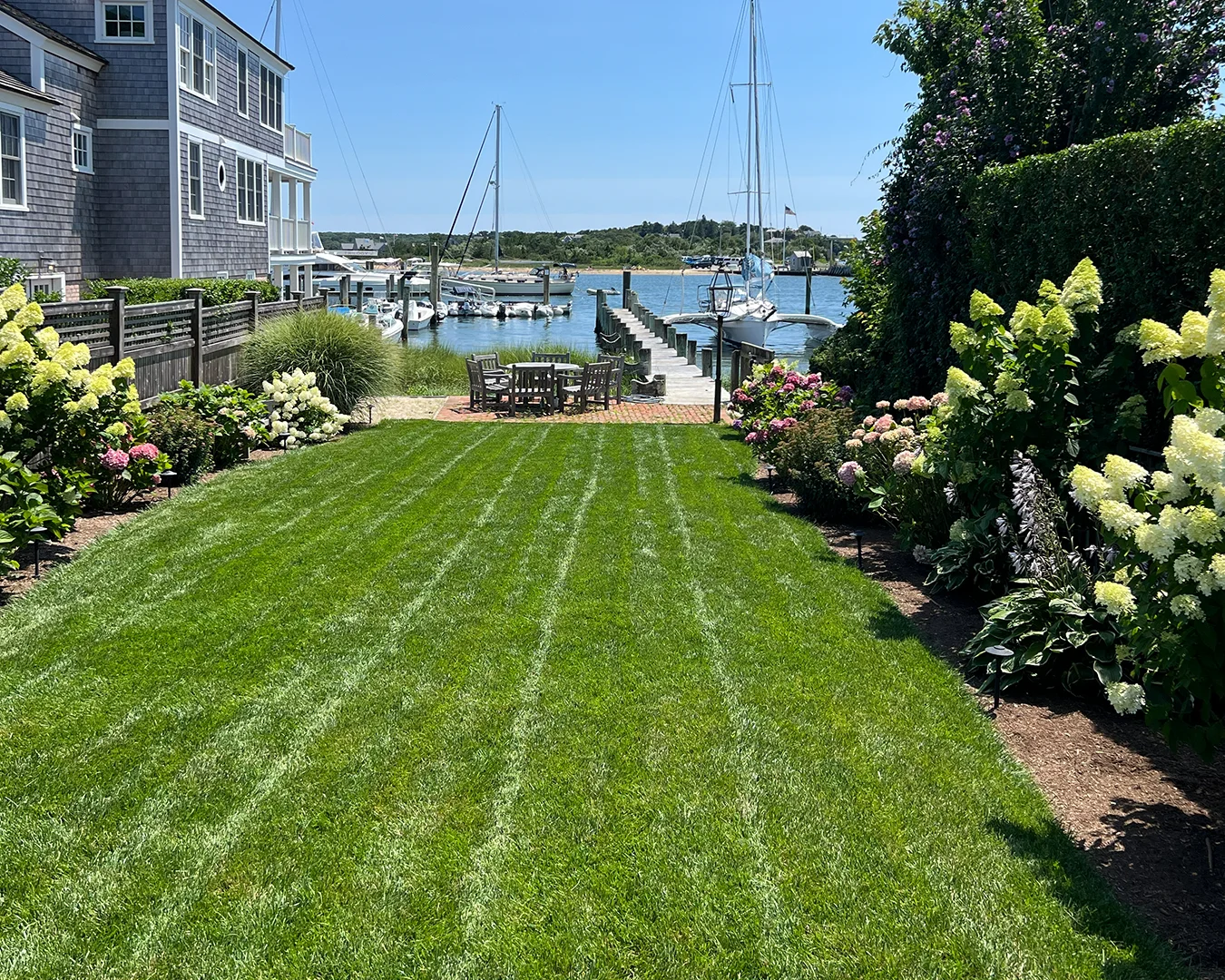 Estate Care lawn professionals at work on a Martha's Vineyard property